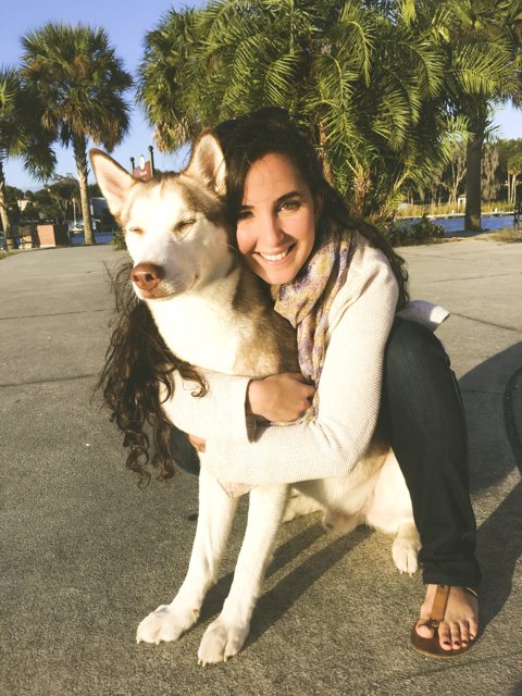 Apollo enjoying a sunny hug with his family — 2015