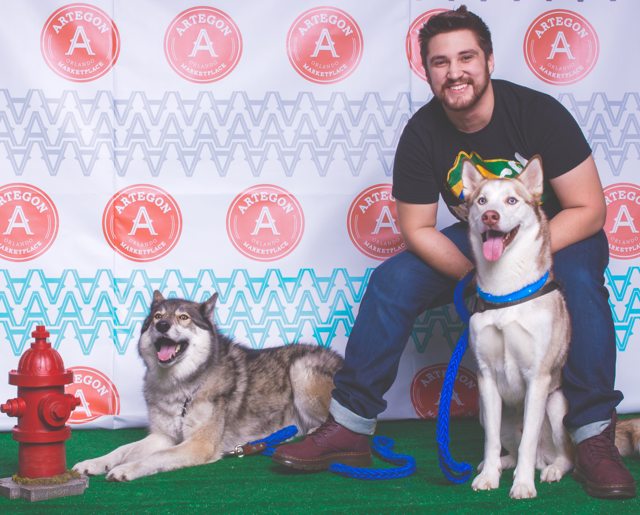 Apollo and a friend posing with family at an event — Year unknown